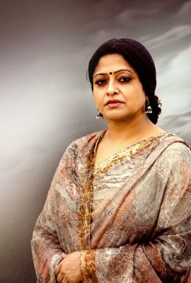 Raasi in A Commanding Role As Savitri in The Red Bag Movie