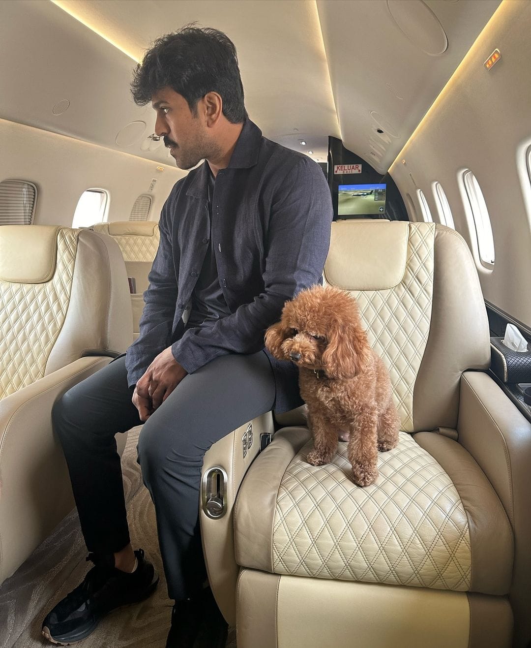 Ram Charan Takes Flight: A Vacation Awaited